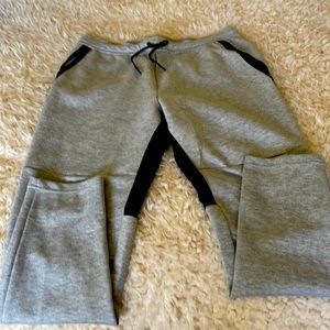 Mens light grey sweatpants with black trim